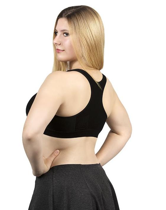The Travel Bra - Comfort Bamboo Travel Bra with Racerback. Including secret pockets to keep valuables safe. Store passports, cash, cards. Can be used with breast prosthesis. Available in nude, pink and black. Sizes extra small, small, medium, large, extra large, 2XL and 3XL.