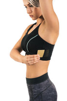 The Travel Bra - Original anti-theft clothing with hidden pockets for passports, jewellery, keys, cash and cards.  Available in sizes Extra Small, Small, Medium, large, Extra Large, 2XL.  Black with blue stitching.