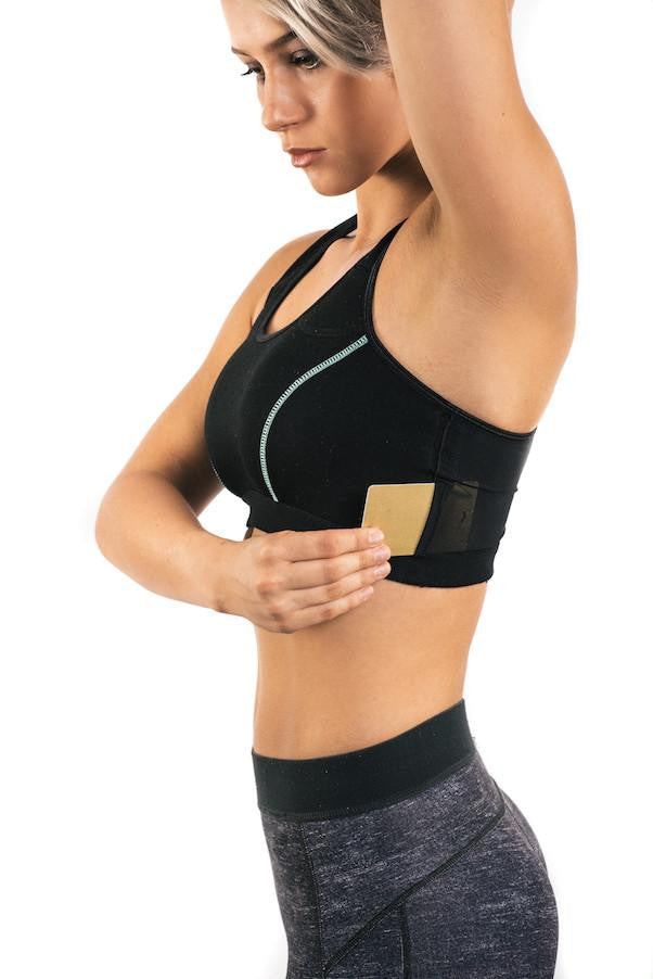 The Travel Bra - Original anti-theft clothing with hidden pockets for passports, jewellery, keys, cash and cards.  Available in sizes Extra Small, Small, Medium, large, Extra Large, 2XL.  Black with blue stitching.